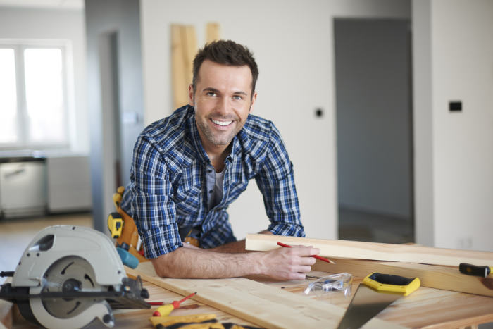 Man doing carpentry work in a home